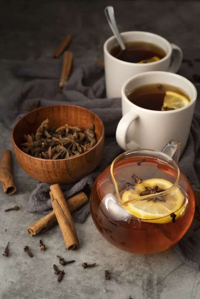 arrangement-a-angle-eleve-avec-de-delicieux-batons-de-the-et-de-cannelle.webp